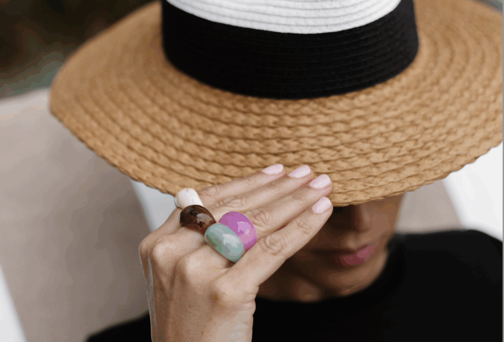 Woman Shading her face from the sun